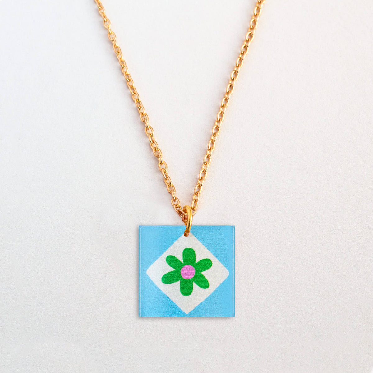 Natalie Lea Owen Blue Square/Green flower Necklace